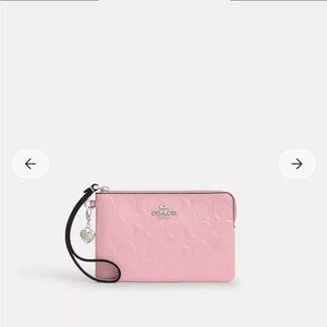 Coach Pink Corner Zip Wristlet
In Signature Leather With Heart Charm